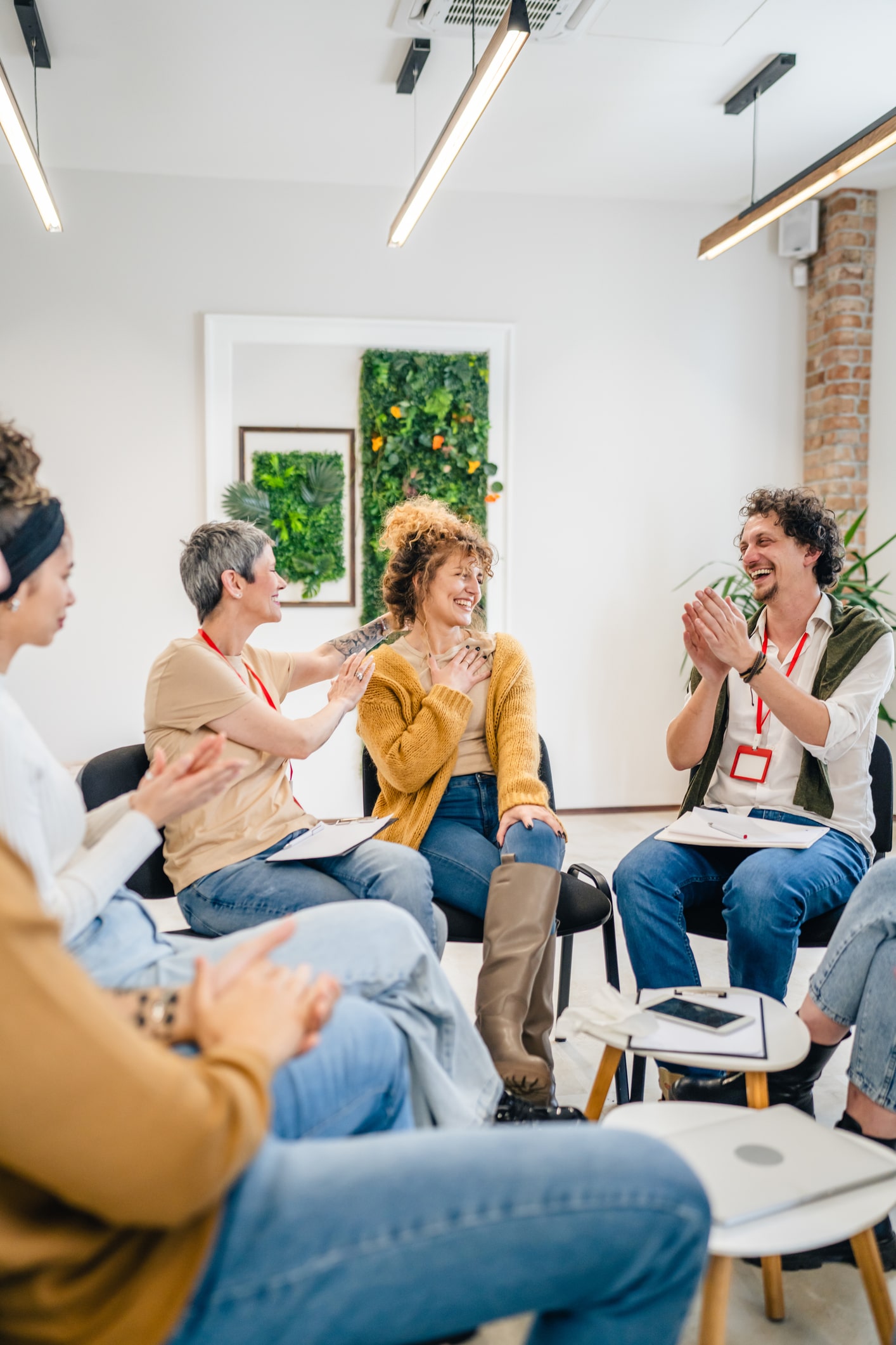 clients in group therapy for addiction and mental health